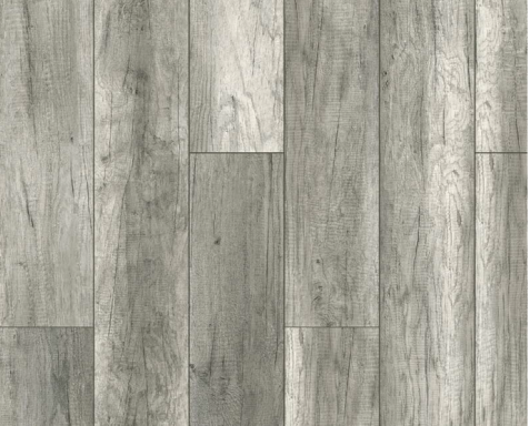 Suelo de madera en tonos grises, con tablones de diferentes texturas y patrones.